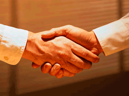 Photo of a handshake between two businessmen