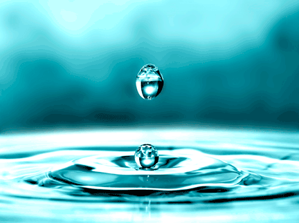 A water drop landing in water
